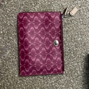 Mini Coach holding bag